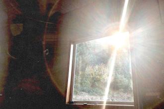 Morning sun peering over the horizon into a bedroom window, showing how the Holy Spirit Leads You into All Truth
